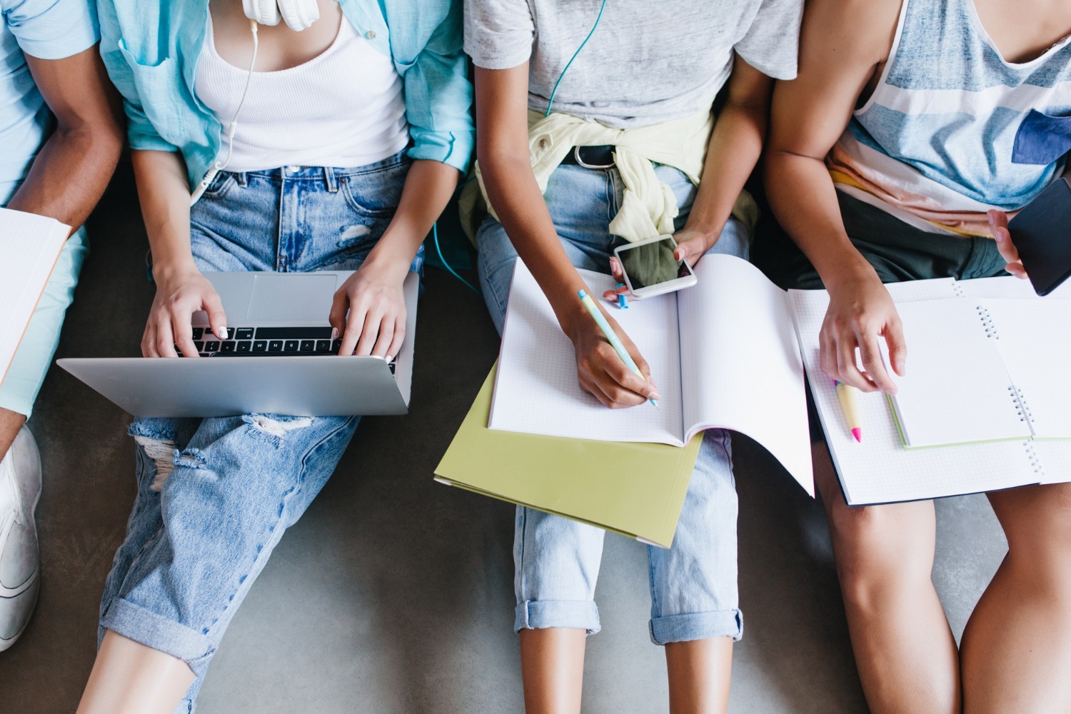 Top 3 Project Marketing Scholarships In 2023 2024 For Successful Future   Close Up Overhead Portrait Girl Blue Shirt Jeans Holding Laptop Knees While Sitting Beside University Mates Female Student Writing Lecture Notebook Using Phone Friends 