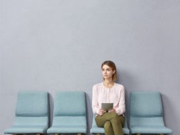 oung woman sitting in waiting room