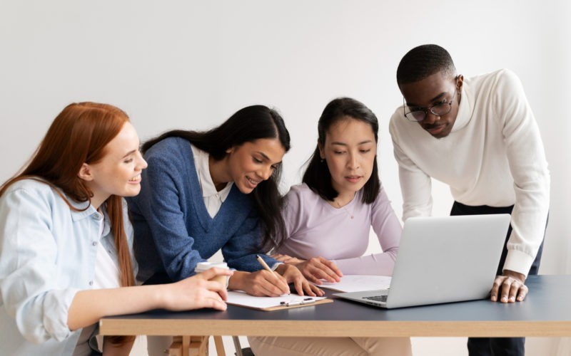 People practicing social integration in workspace