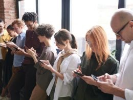 Young people chatting on smartphones