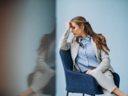 Businesswoman sitting in chair at an office