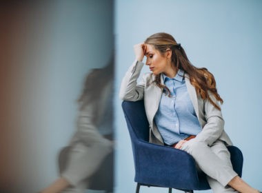 Businesswoman sitting in chair at an office