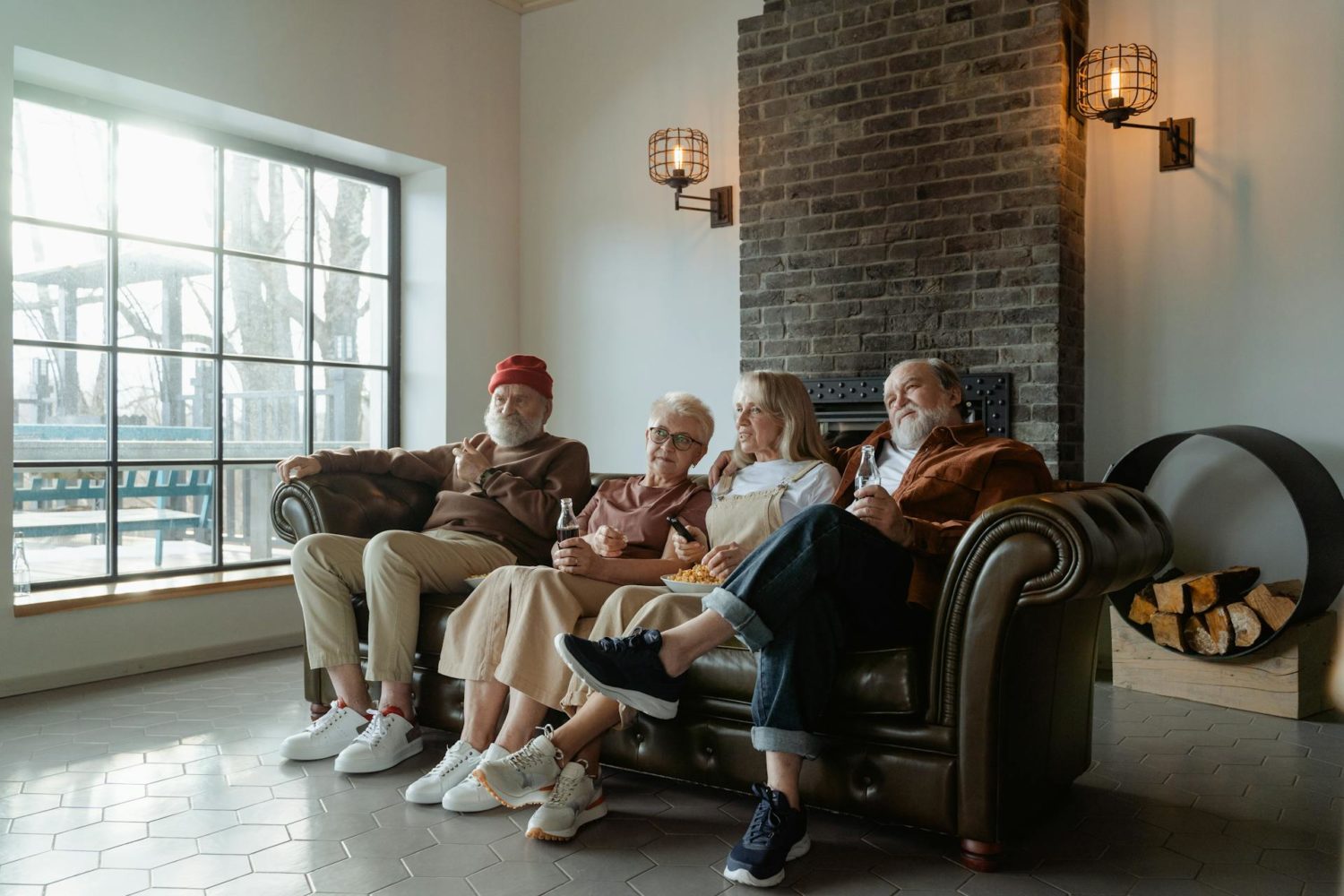 People Sitting on a Leather Couch