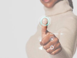 Woman scanning fingerprint with futuristic interface smart technology