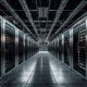 A long hallway with a row of servers in the center.