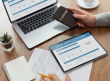 Visa application form on laptop and tablet