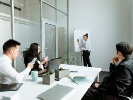 A Group of People Having a Meeting in the Office
