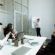 A Group of People Having a Meeting in the Office