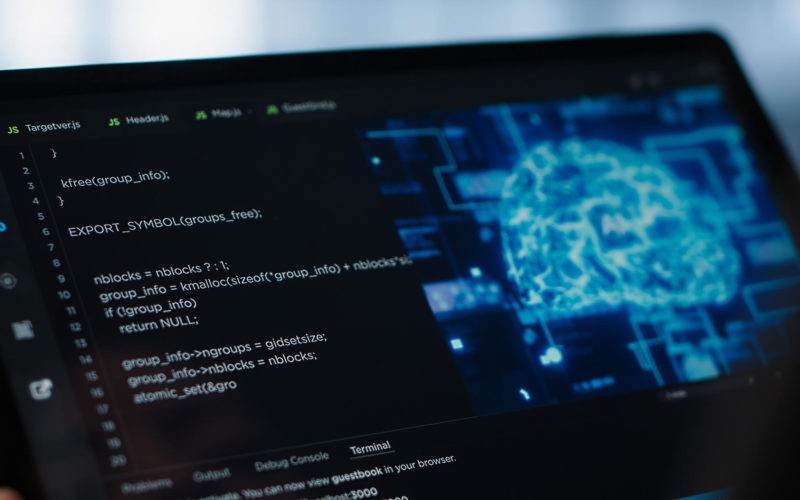 Data center technician using artificial intelligence on tablet close up