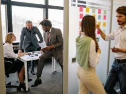 Group Of People Discussing About Work