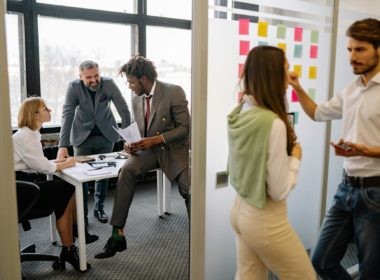Group Of People Discussing About Work