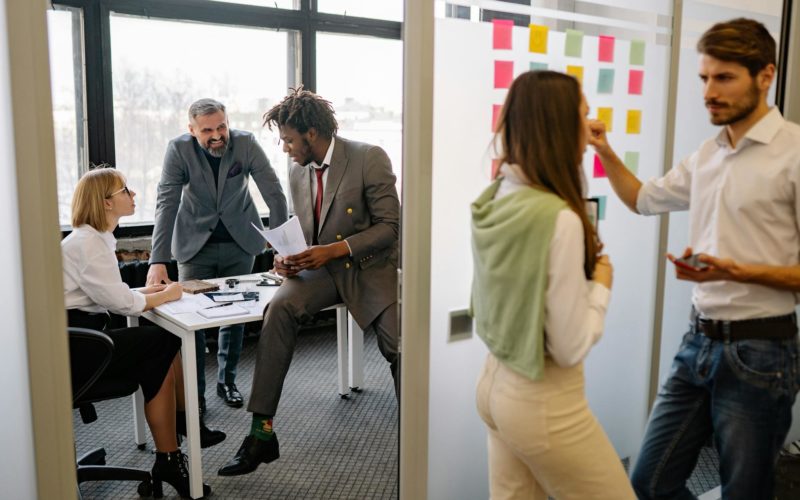 Group Of People Discussing About Work