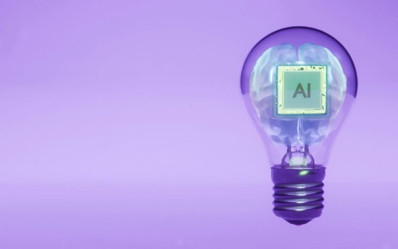 Ai brain inside a lightbulb illustrates an idea