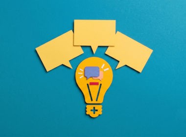 A modern conceptual cover graphic symbolizing the fusion of conversation and ideas, where individual speech is amplified by integrated intelligence and purposeful connection.